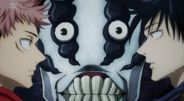 Yuji und Megumi blicken auf eine gruselige Maske. Ein Moment aus Jujutsu Kaisen, der die Spannung zeigt.
