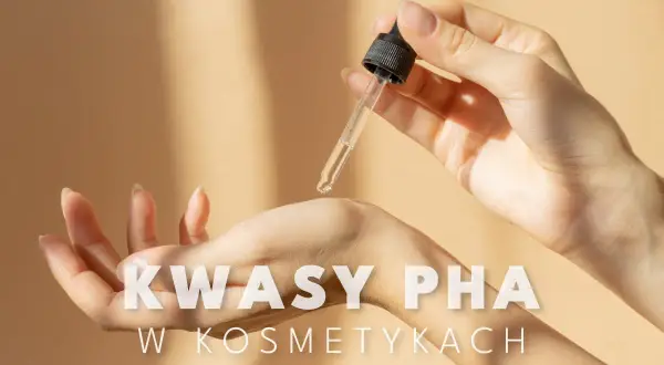 Delikatna skóra dłoni, na którą spada kropla serum z pipety. Tekst: Kwasy PHA w kosmetykach.