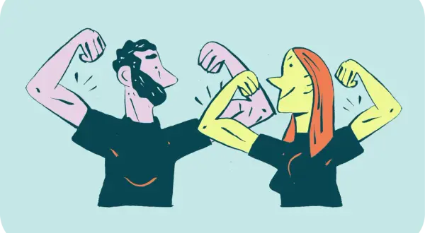 Para jak zwiększyć pewność siebie w kontaktach z ludźmi: mężczyzna i kobieta pokazują swoje bicepsy, symbolizując siłę i pewność siebie.