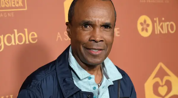 Sugar Ray Leonard, a boxing legend, smiles. His career earnings are a testament to his skill, though his net worth is a separate matter.