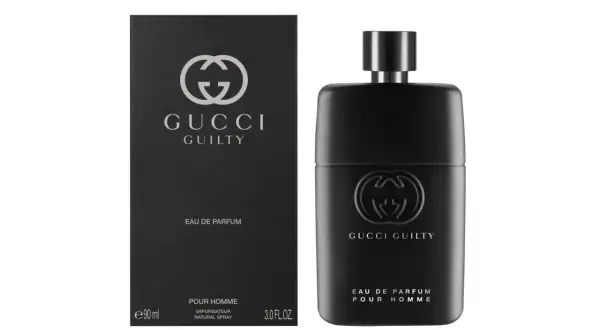 Czarny flakon i opakowanie Gucci Guilty Black dla mężczyzn, z wytłoczonym logo i napisem.