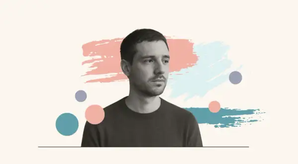 Mężczyzna wpatrzony w dal, otoczony abstrakcyjnymi pociągnięciami pędzla i kółkami. Jego spojrzenie sugeruje głębokie emocje samoświadomościowe.