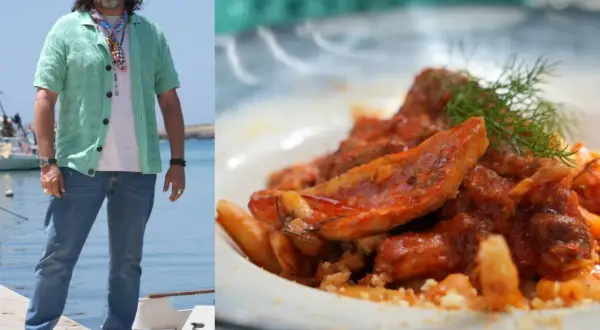 Chef Antonino Cannavacciuolo in Lampedusa, pronto per assaggiare i piatti di 4 ristoranti. Pasta al sugo di pesce in primo piano.