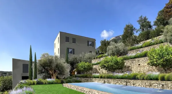 Moderna limonaia struttura con piscina e terrazzamenti fioriti.