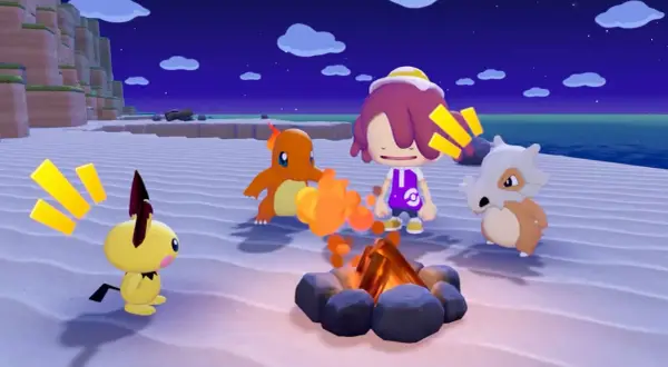 Pikachu, Charmander i Cubone przy ognisku na plaży. W tle nocne niebo i klify. To scena z gry Pokemon.