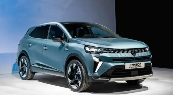 Niebieski SUV Symbioz prezentuje nowoczesny design i innowacyjną technologię.