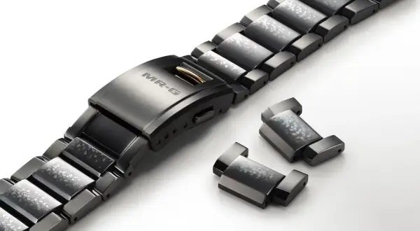 Brazalete de reloj MR-G con eslabones decorados y piezas sueltas, ideal para quitar eslabones reloj sin pasador.