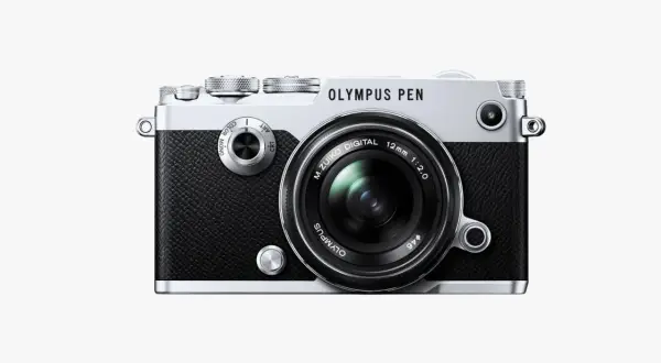 The Olympus PEN-F camera, a stylish blend of retro design and modern technology, ready to capture your next masterpiece.