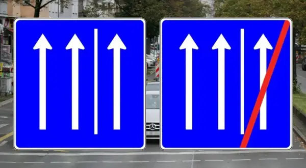 Verkehrsschilder zeigen drei Fahrspuren geradeaus. Rechts endet die rechte Spur, die man nicht mehr befahren darf.