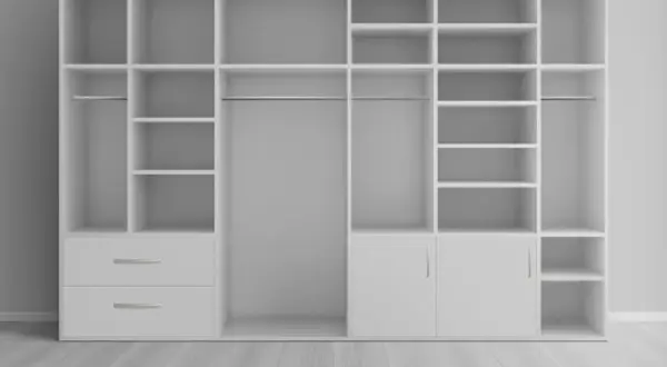 Un placard profond blanc avec étagères, penderies et tiroirs, idéal pour aménager un espace de rangement optimisé.