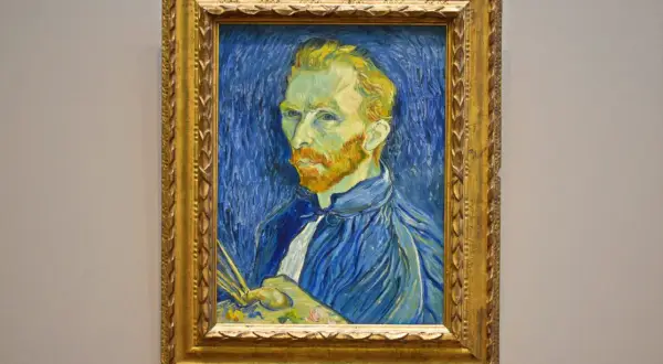 Portret Vincenta van Gogha, artysty, którego burzliwy **van gogh życiorys** inspirował pokolenia. Widać pędzel i paletę, gotowe do uchwycenia kolejnego fragmentu świata.