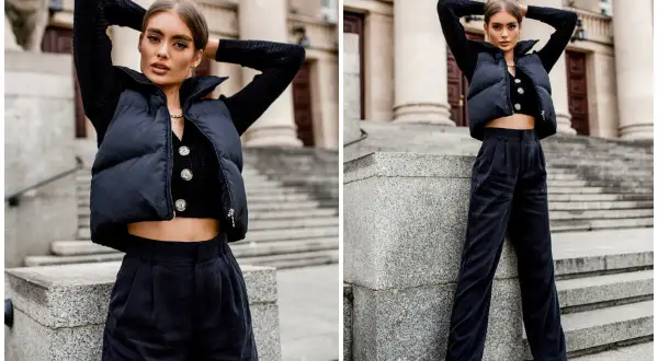 Elegancka stylizacja z kamizelką: czarny, krótki puchowy bezrękawnik na sweter, szerokie spodnie i masywne buty.