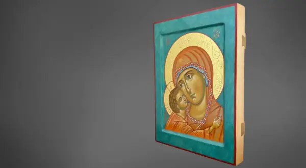 Ikony Matki Boskiej prawosławne: wzruszający obraz przedstawiający Maryję z Dzieciątkiem Jezus, otoczonych złotym tłem i ozdobną ramą.