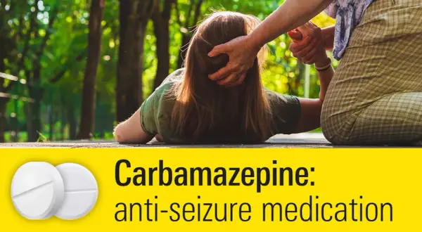 Osoba pomaga drugiej, która upadła. Na dole białe tabletki i napis "Carbamazepine: anti-seizure medication". Neurotop może pomóc w takich sytuacjach.