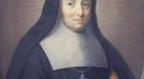 Portret zakonnicy w czarnym habicie i białym gorsecie. W dłoni trzyma płonące serce. Święto św. Klary z Asyżu obchodzone jest 11 sierpnia, ale jej wspomnienie liturgiczne przypada na 12 sierpnia.