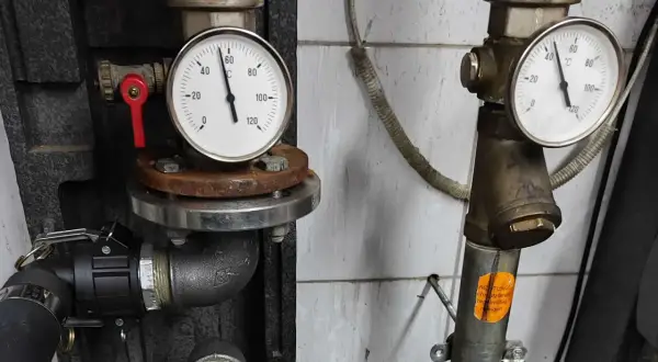 Manometr wskazuje temperaturę ok. 40°C podczas płukania instalacji CO. Widoczne zawory i rury.