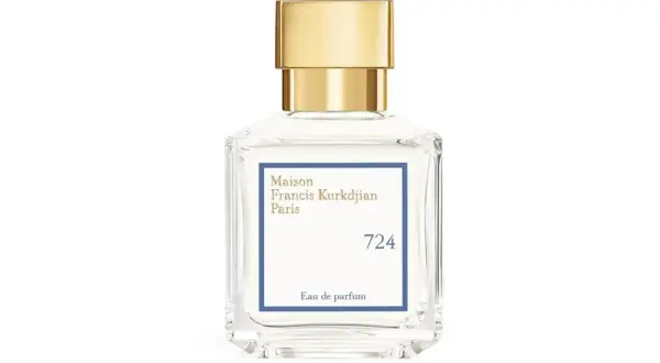 Elegancka butelka perfum Maison Francis Kurkdjian 724 z złotą nakrętką.