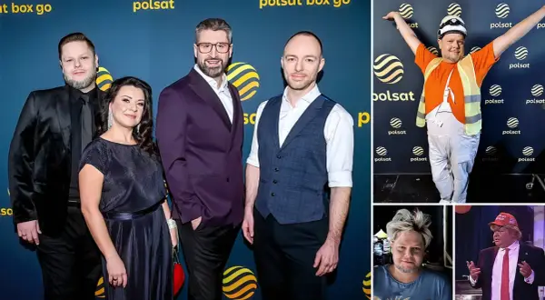 Grupa osób pozuje do zdjęć na tle niebieskiej ścianki z logo Polsat Box Go.