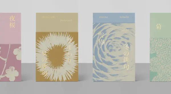 Książki z japońskimi motywami kwiatowymi i napisami, w tym "haiku co to".