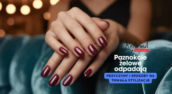 Dłonie z bordowymi paznokciami żelowymi. Dowiedz się, dlaczego żel odchodzi od wolnego brzegu i jak temu zapobiec.