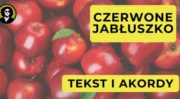 Czerwone jabłuszko, tekst i akordy. W tle mnóstwo soczystych jabłek.