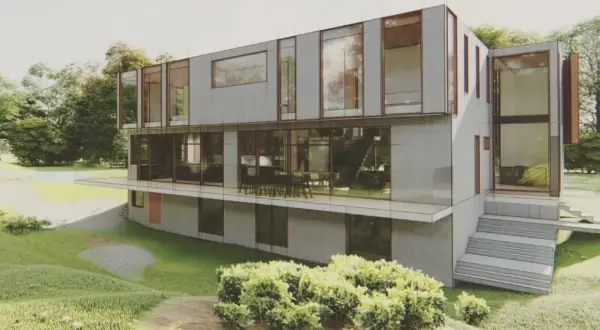 Modern architect's home in the ravine, featuring glass walls and cantilevered levels, nestled amongst lush greenery.