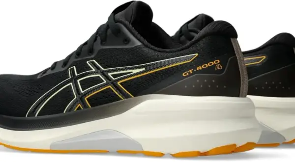 Czarne buty sportowe Asics GT-4000 z żółtymi i jasnożółtymi detalami, idealne do biegania.