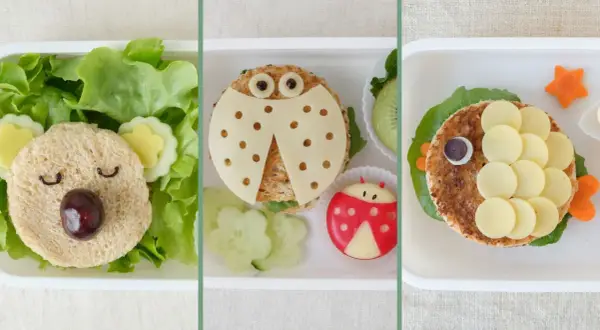 Kreative Pausenbrot Ideen für Kinder: Ein Bär, Marienkäfer und Fisch aus Sandwiches und Gemüse.