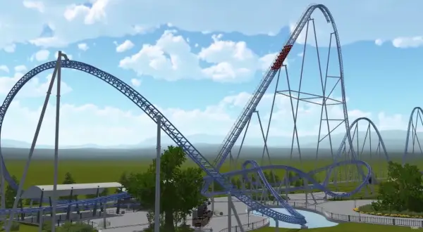 Kolejka górska Hyperion Energylandia z wagonikami wjeżdżającymi na wysoki tor.