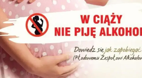 Ciężarna kobieta z dłońmi na brzuchu. Napis: "W ciąży nie piję alkoholu. Dowiedz się jak zapobiegać FAS!".