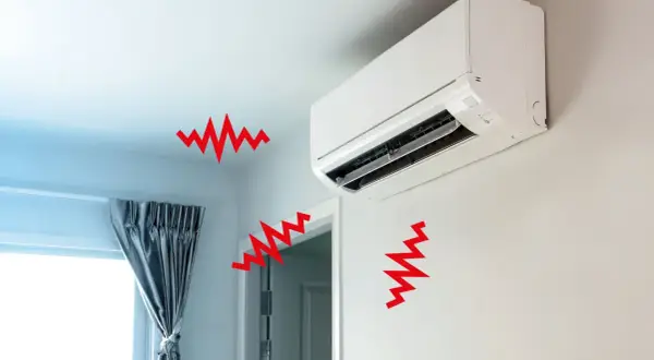 Un condizionatore d'aria bianco emette onde rosse che simboleggiano la rumorosità, disturbando la quiete della stanza.