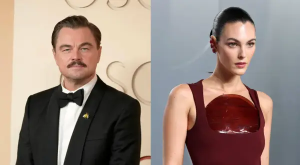 Leonardo DiCaprio con esmoquin y su posible novia, Vittoria Ceretti, con un vestido burdeos y pendientes llamativos.