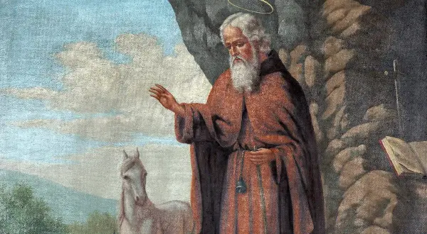 Św. Antoni z Padwy, otoczony aurą, błogosławi zwierzęta. Obok niego koń i krowa, symbolizujące cuda św. Antoniego.