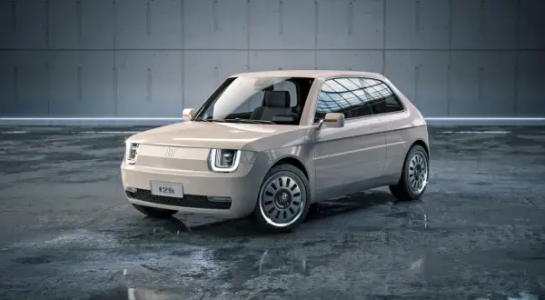 Nowoczesny polski fiat 126p w beżowym kolorze, z charakterystycznymi kwadratowymi światłami i stylowymi felgami, stoi na mokrej posadzce.