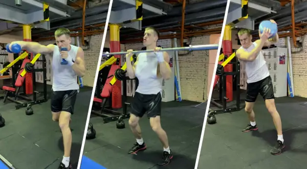 Man training to increase punch strength with dumbbells, barbell, and medicine ball in a gym.