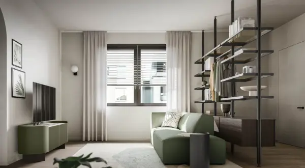 Divano angolare e mobile TV in un rilassante verde salvia colore, con scaffalatura a vista e un'elegante porta.