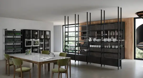 Un tavolo di vetro moderno con sedie verdi, circondato da scaffalature eleganti, perfetto per chi cerca idee su come abbellire un tavolo di vetro.