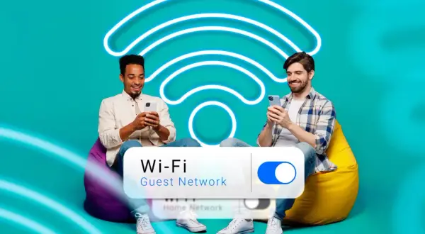 Deux hommes souriants sur des poufs, utilisant leurs téléphones. Un grand symbole Wi-Fi lumineux et un interrupteur "Wi-Fi Guest Network" sont visibles.