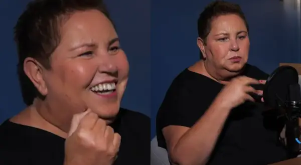 Dorota Wellman waga: uśmiechnięta i skupiona podczas rozmowy przy mikrofonie.