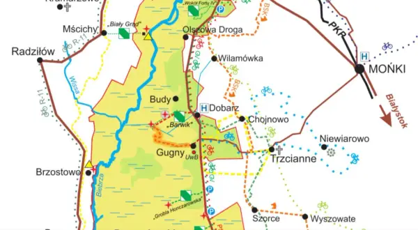 Mapa turystyczna **Biebrzańskiego Parku Narodowego** z zaznaczonymi miejscowościami, drogami i szlakami.