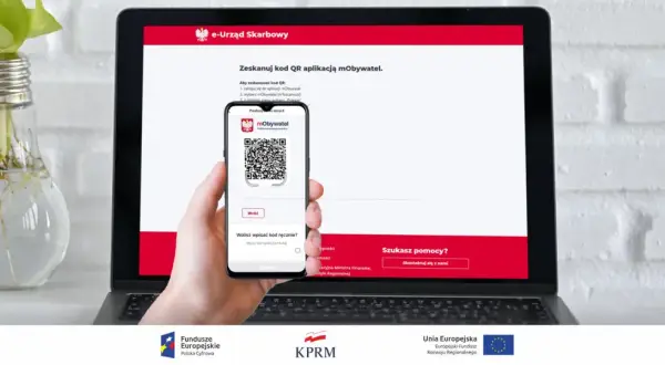Jak rozliczyć PIT przez mObywatel? Zeskanuj kod QR z aplikacji mObywatel na ekranie laptopa e-Urzędu Skarbowego.