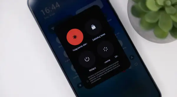 Menu z opcjami wyłączania telefonu. Pokazuje jak wyłączyć telefon, naciskając przyciski zasilania i głośności.