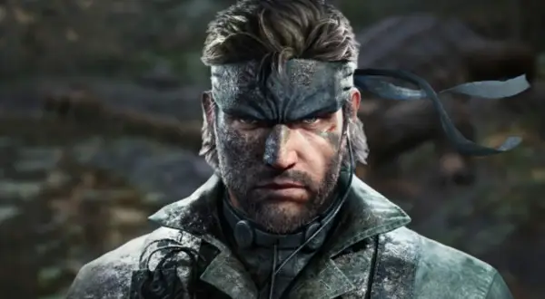 Twarz Big Bossa z gry Metal Gear Solid V, stworzona w silniku Fox Engine. Widać jego charakterystyczną opaskę i kamuflaż.