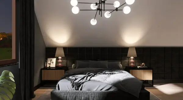 Nowoczesna sypialnia z łóżkiem i lampkami nocnymi, przypominająca wnętrze w stylu zamkowym.