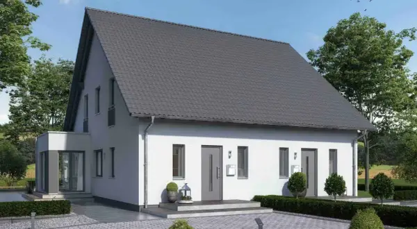 Modernes Doppelhaus mit grauen Ziegeln und weißer Fassade. Informieren Sie sich über die doppelhaus kosten für dieses attraktive Zuhause.