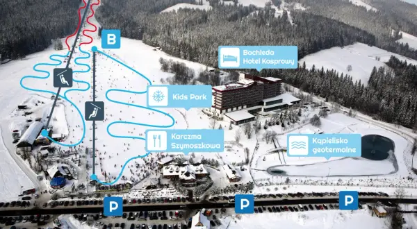Widok z lotu ptaka na stację narciarską Suche z trasami, wyciągami, hotelem Bachleda, karczmą i basenem geotermalnym.