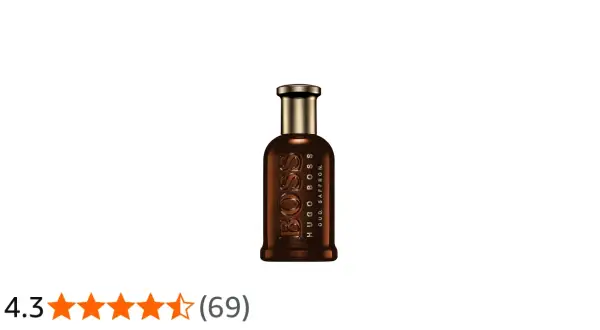 Elegancka butelka perfum Hugo Boss Oud Saffron o bogatym, brązowym odcieniu.