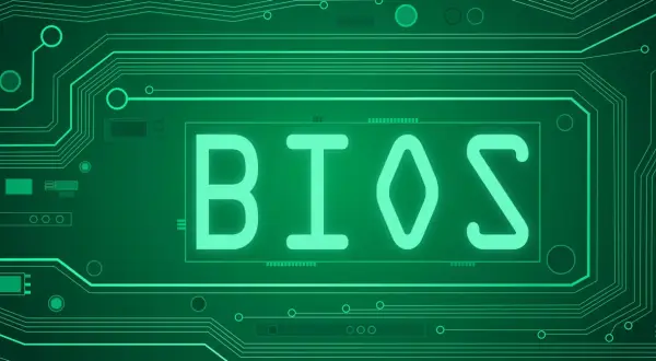 Zielony schemat obwodu drukowanego z napisem BIOS. Dowiedz się, jak zaktualizować BIOS, aby poprawić wydajność komputera.