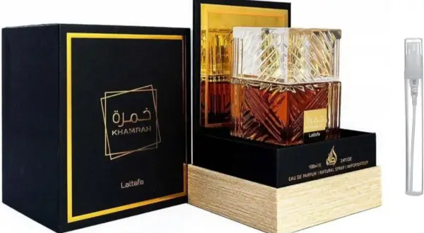 Eleganckie opakowanie i flakonik perfum Lattafa Khamrah. Złote zdobienia i ciemna kolorystyka podkreślają luksusowy charakter.