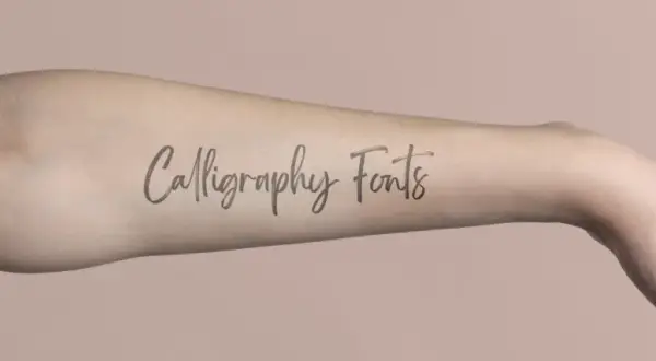 Ramię z napisem "Calligraphy Fonts" - inspiracja dla najładniejszych czcionek na tatuaż.